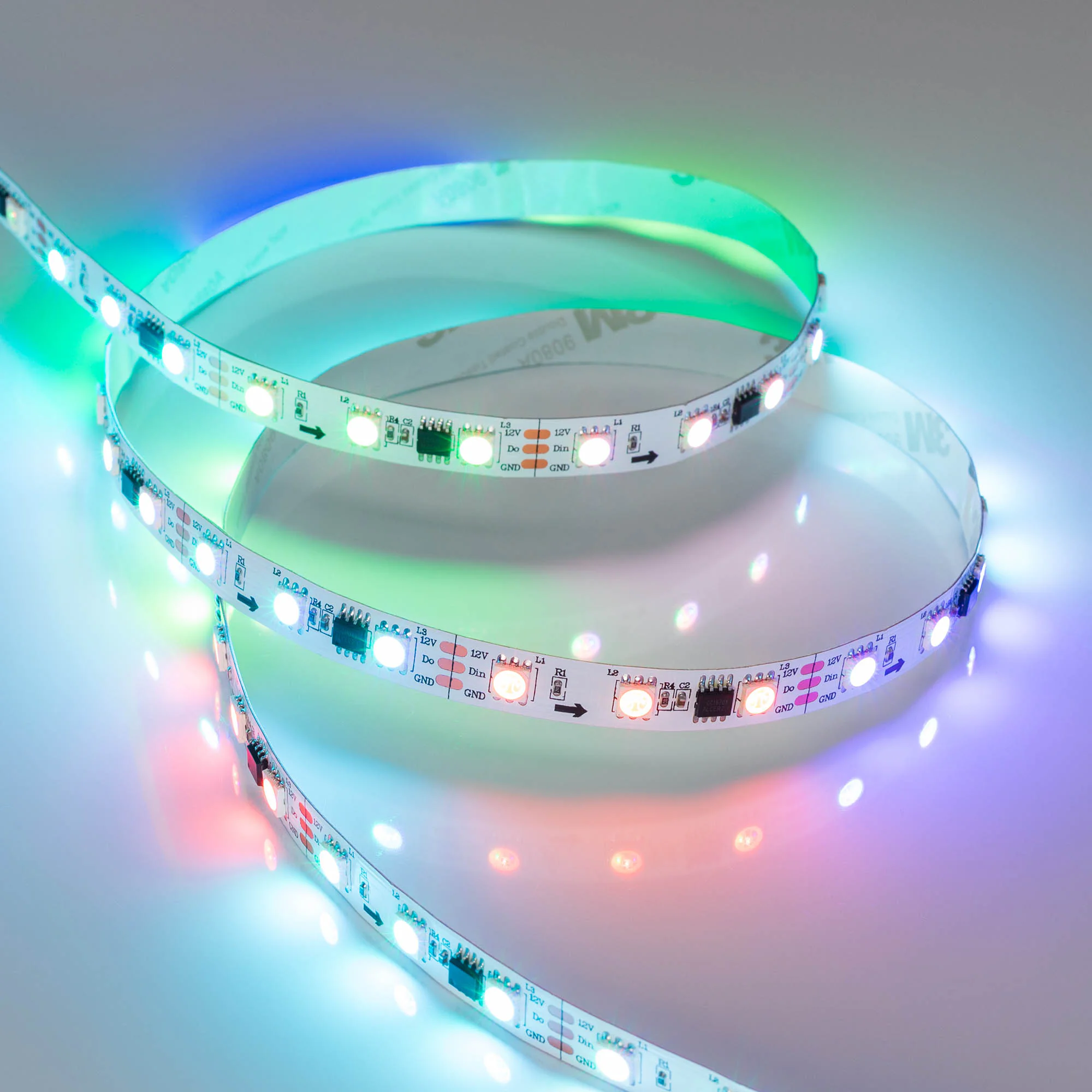 Лента SPI-B60-10mm 12V RGB-PX3 (14.4 W/m, IP20, 5060, 5m) 026367(2) - Светодиодная лента SPI-B60, открытая IP20, микросхема 16703. Светодиоды SMD 5060, 60шт/м (300шт на 5 м), 20 pixel/m (1 pixel = 3 LED), белая плата, ширина 10мм, скотч 3М. Цвет RGB, угол