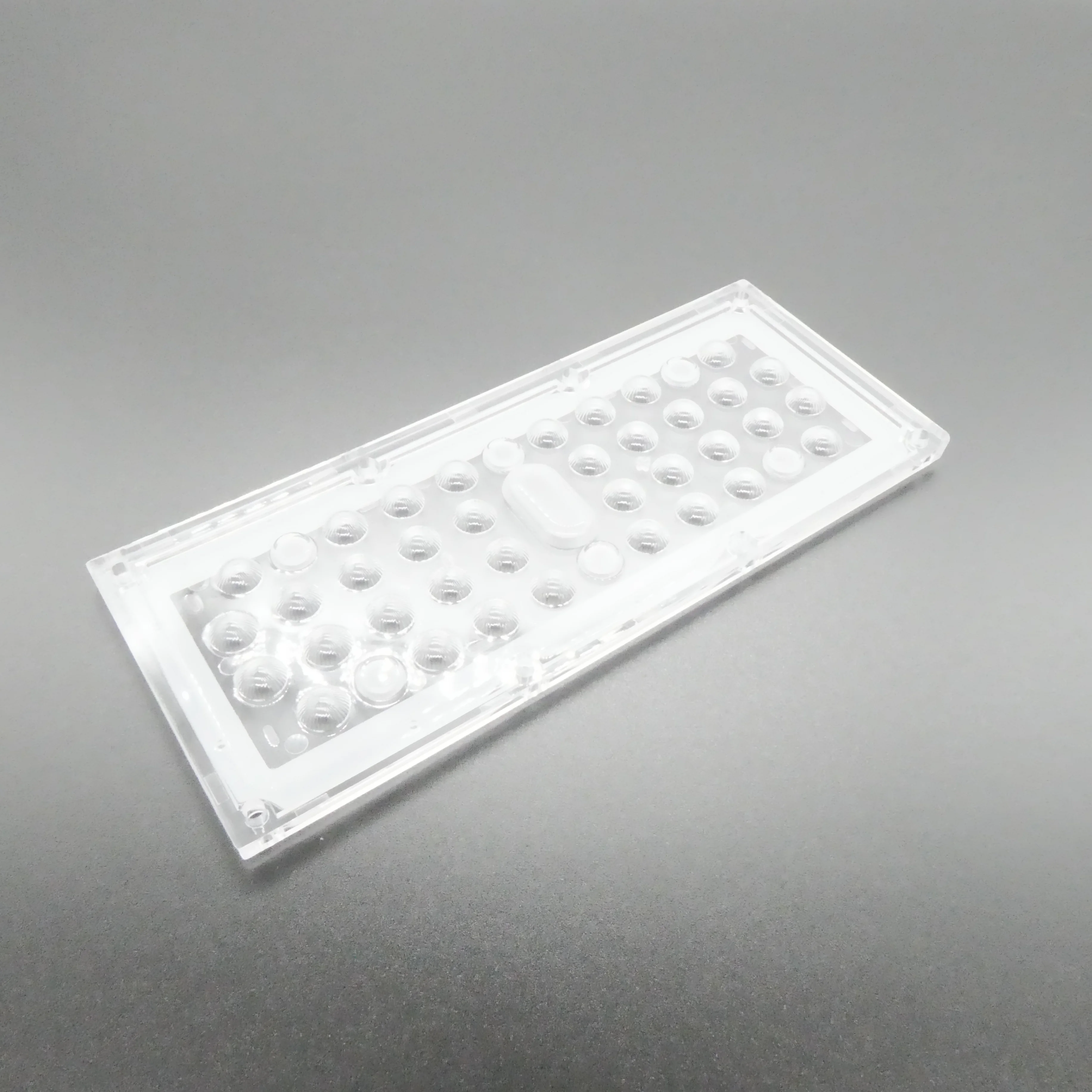ALHB173D36LED90G - Групповая прямоугольная линза 36 светодиодов 3030/3535,  90°, 173x71.4mm   H:9.3mm, PMMA