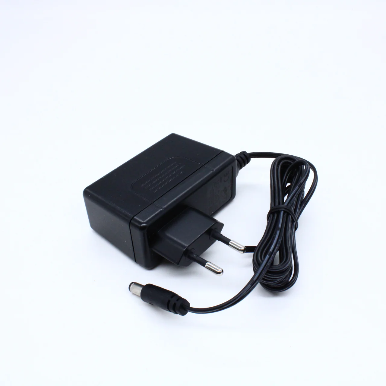 SGA25E24-P1J - AC-DC, сетевой адаптер, 25Вт, вход 90...264B AC 47...63 Гц, выход 24B/1.04A, изоляция 3000В AC, 75.5x32x47.5 мм, -20...+60°С, выходной разъем длина 11 мм, диаметр 2.1x5.5 мм